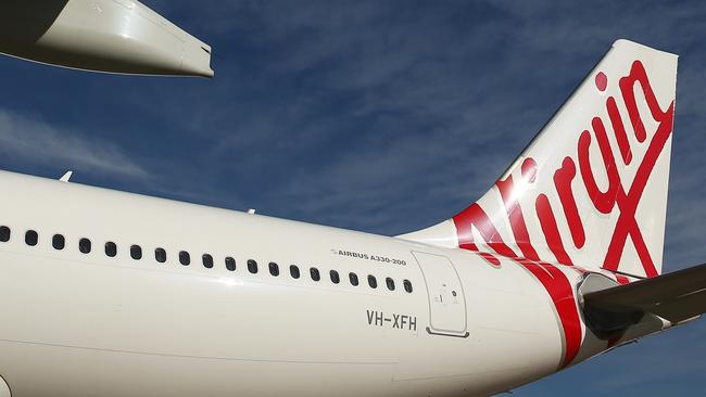 Virgin Australia has rejected reports the dog was left out in the sun.