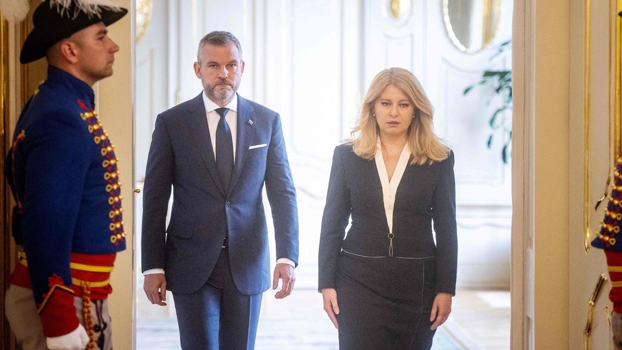 Slovak President Zuzana Caputova (R) and president-elect of Slovakia, Peter Pellegrini, arrive for a press conference in Bratislava, on May 16, 2024 following the attack. (Photo by VLADIMIR SIMICEK / AFP)