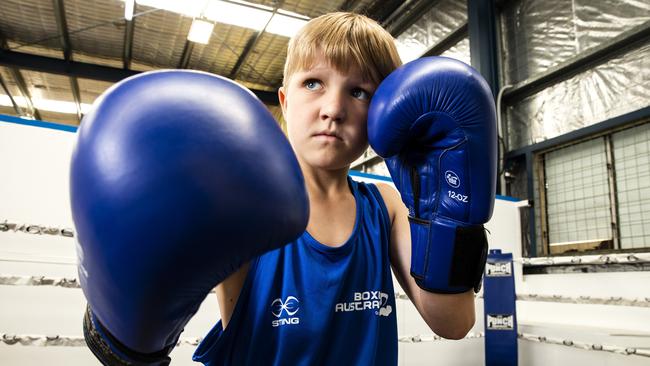 Taj Harrington, 12, has been boxing since the age of six. (AAP Image/Richard Walker)