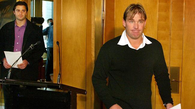 Warne watched by his brother and manager Jason after his suspension.