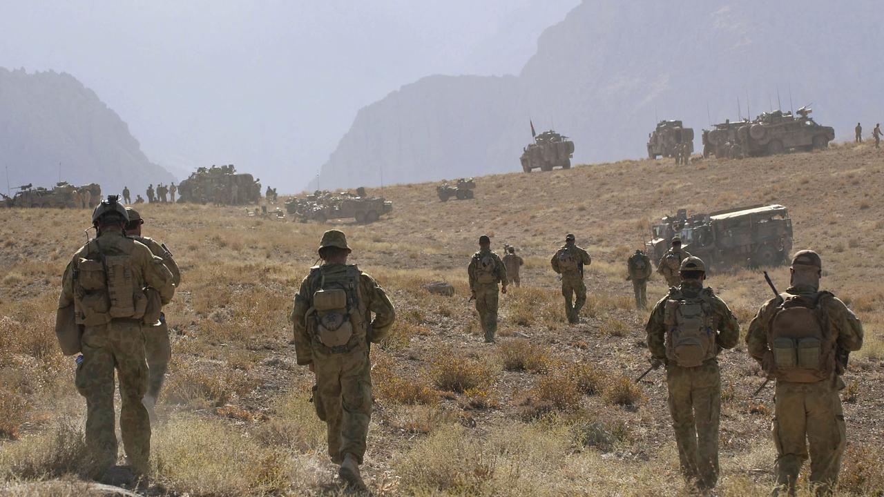 Soldiers from the Special Operations Task Group prepare to clear a valley of Taliban extremists during a counter insurgency operation in Oruzgan Province, Afghanistan. Picture: Defence