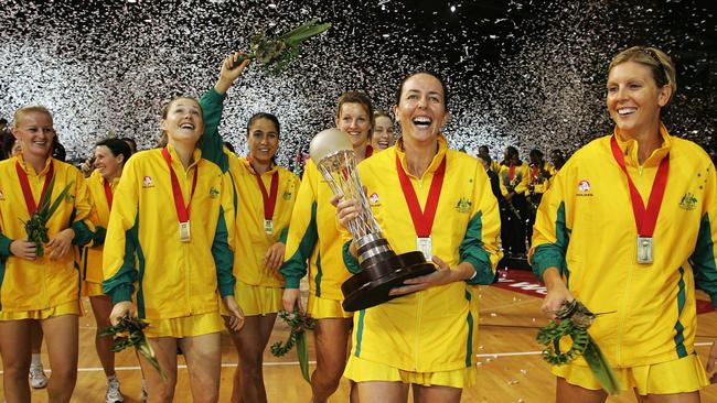 Former Australian captain Liz Ellis holds the trophy after the Diamonds won the 2007 netball world championship.