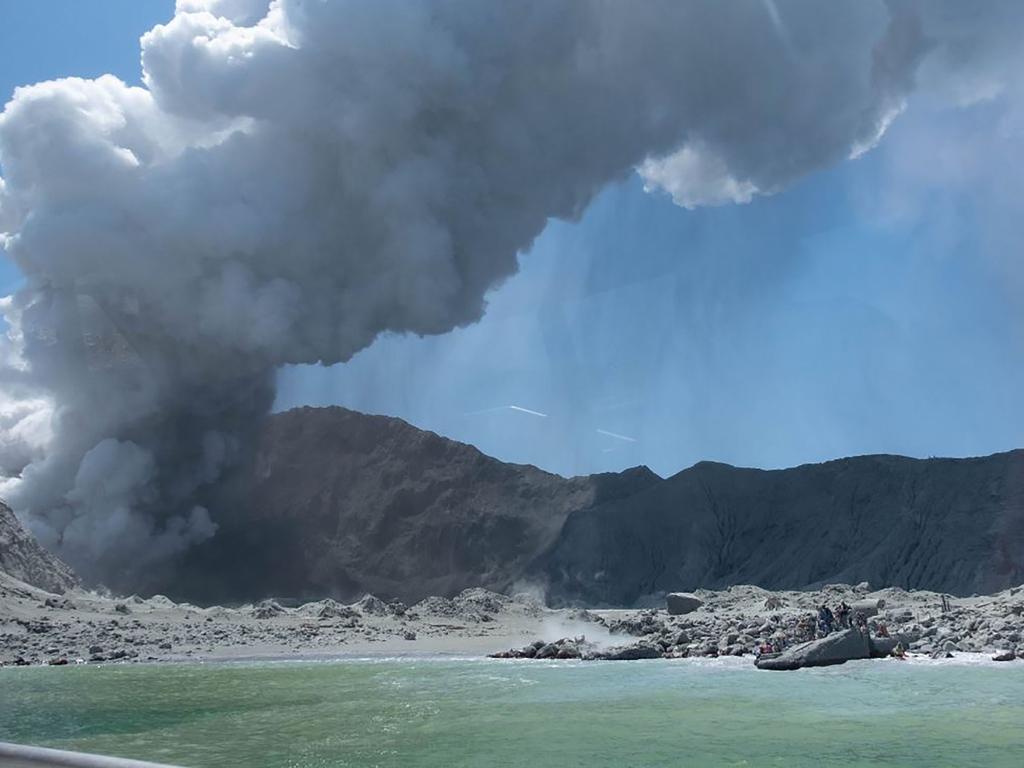 This handout photograph courtesy of Michael Schade shows the volcano on New Zealand's White Island spewing steam and ash minutes following an eruption. Picture: Michael Schade / AFP