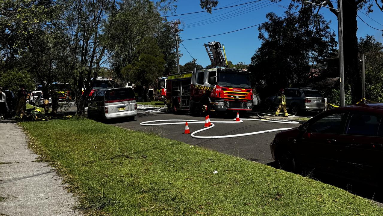 Firefighters at the scene on Sunday afternoon. Picture: Tyson Jackson