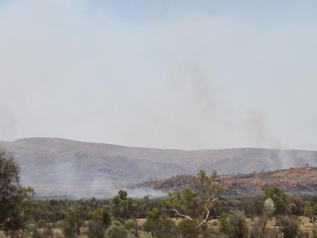 A bushfire burning west of Alice Springs has shut sections of the Larapinta Trail on the West MacDonnell Ranges, as well as Standley Chasm, with no reopening date set as of February 1, 2025. Picture: Gera Kazakov