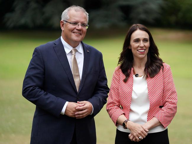 Australia's Prime Minister Scott Morrison (L) poses with his New Zealand counterpart Jacinda Ardern at Government House in Auckland on February 22, 2019. - Morrison is in New Zealand to hold bilateral talks with his Kiwi counterpart Jacinda Ardern. (Photo by Diego OPATOWSKI / AFP)