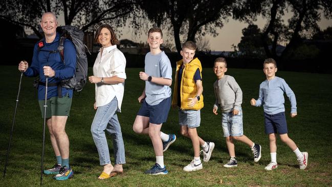 Orthopaedic surgeon Matthew Hutchinson with his family wife Annie and sons Oliver, 13, Jack, 11, Tommy, 9, and Teddy, 7, in Burchell Reserve, St Peters. Picture: Emma Brasier