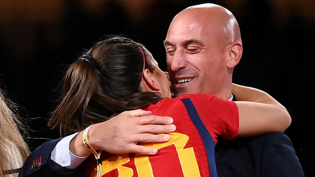 Spain's defender #20 Rocio Galvez (L) is congratuled by President of the Royal Spanish Football Federation Luis Rubiales (R). (Photo by FRANCK FIFE / AFP)