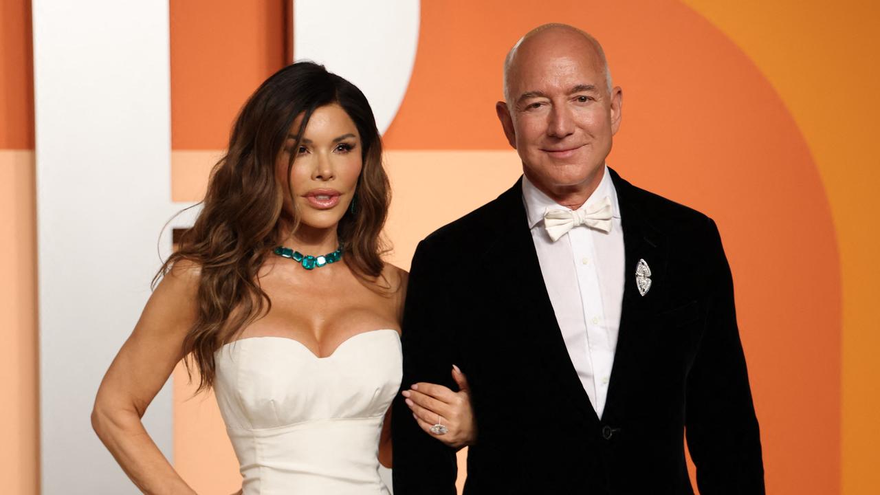 CEO of Amazon and fellow billionaire Jeff Bezos attended the event with his partner Lauren Sanchez. Picture: Michael Tran/AFP