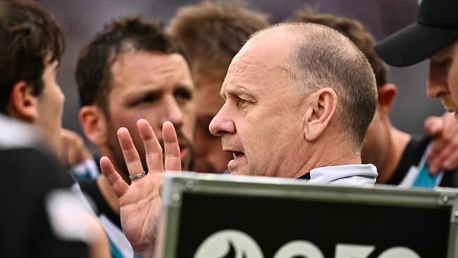 PERTH, AUSTRALIA - AUGUST 25: Ken Hinkley, Senior Coach of the Power addresses the players at the break during the 2024 AFL Round 24 match between the Fremantle Dockers and the Port Adelaide Power at Optus Stadium on August 25, 2024 in Perth, Australia. (Photo by Daniel Carson/AFL Photos via Getty Images)