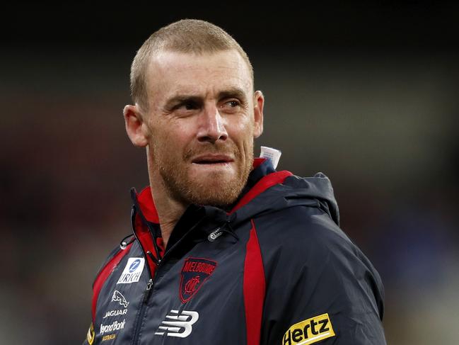 MELBOURNE, AUSTRALIA - APRIL 24: Senior coach Simon Goodwin of the Demons looks on during the 2021 AFL Round 06 match between the Melbourne Demons and the Richmond Tigers at the Melbourne Cricket Ground on April 24, 2021 in Melbourne, Australia. (Photo by Dylan Burns/AFL Photos via Getty Images)