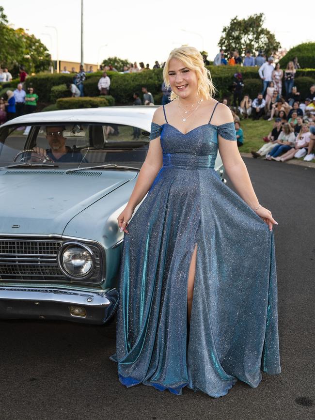 Olivia Bennett arrives at Harristown State High School formal at Highfields Cultural Centre, Friday, November 18, 2022. Picture: Kevin Farmer