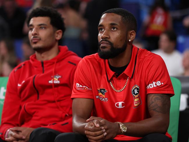 PERTH, AUSTRALIA - OCTOBER 25: Bryce Cotton of the Wildcats looks on from the bench as players warm up during the round six NBL match between Perth Wildcats and Sydney Kings at RAC Arena, on October 25, 2024, in Perth, Australia. (Photo by Paul Kane/Getty Images)