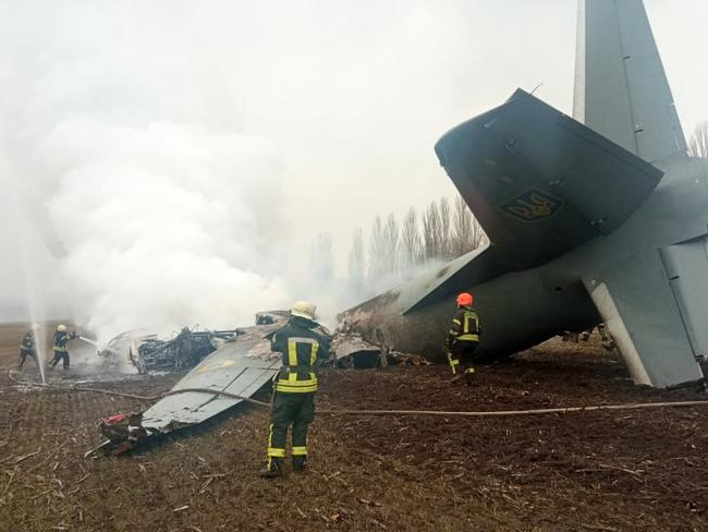 A Ukrainian military plane with 14 people aboard crashed south of Kyiv. Emergency services said they were still determining how many people died. Picture: AFP