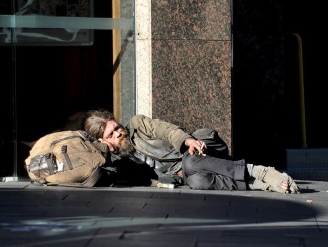 A man sleeping rough in Sydney. People who are homeless may also be sleeping in cars or couch surfing. Picture: AAP Image/Joel Carrett