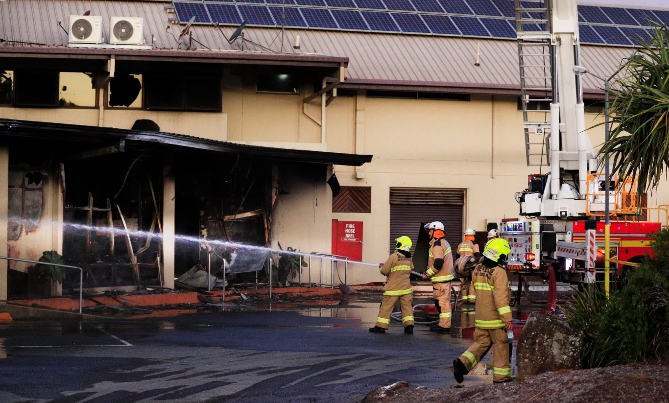 Queensland Fire Brigade Officers assist local Kingscliff and Tweed Fire and Rescue Units to fight the fire at the Cudgen Leagues CLub Kingscliff .Photo Scott Powick Newscorp