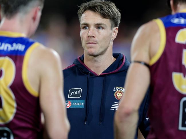 BRISBANE, AUSTRALIA - MAY 05: Lincoln McCarthy of the Lions is seen duiring the three quarter time huddle during the 2024 AFL Round 08 match between the Brisbane Lions and the Gold Coast SUNS at The Gabba on May 05, 2024 in Brisbane, Australia. (Photo by Russell Freeman/AFL Photos via Getty Images)