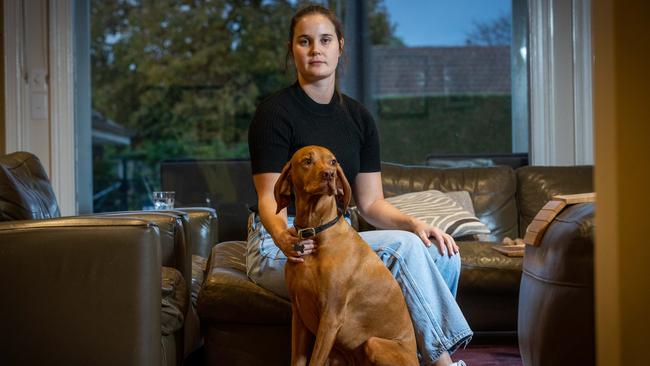 Annabel Thomson and her dog Austin came across two masked intruders in her home. Picture: Jake Nowakowski