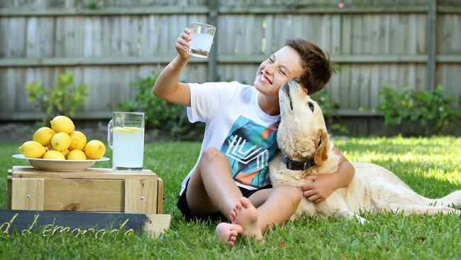 Toby Walker-Levy checks out the Well + Truly Muddled lemonade he takes to markets. Picture: Richard Dobson