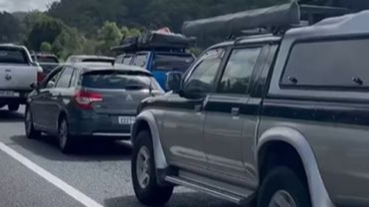 Motorists in a line of traffic held up on the Bruce Hwy had some entertainment as they waited when a guitarist whipped out his instrument and played Metallica's Master of Puppets. Picture: Instagram