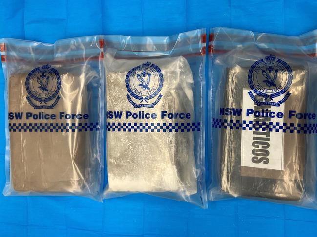 Images supplied by NSW Police show packages of what is alleged to be cocaine found in a car south of Coffs Harbour. Police allege the packages, weighing 3.6kg, are worth about $900,000.