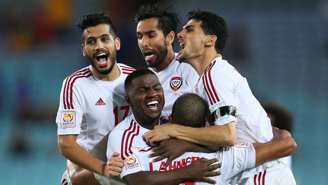 Ismail Ahmed of the United Arab Emirates celebrates with teammates.