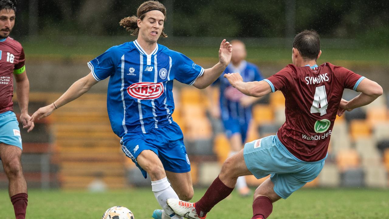 Olympic substitute Darcy Burgess against Josh Symons. Picture: Julian Andrews