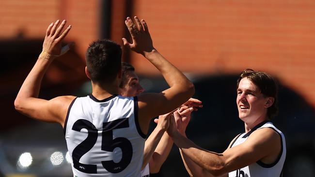 Will McLachlan celebrates a goal. Picture: Graham Denholm/AFL Photos via Getty Images