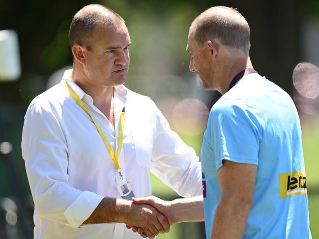 MELBOURNE, AUSTRALIA - NOVEMBER 22: Brad Green the President of the Demons shakes hands with Simon Goodwin, Senior Coach of the Demons during a Melbourne Demons AFL training session at Gosch's Paddock on November 22, 2024 in Melbourne, Australia.  (Photo by Quinn Rooney/Getty Images)