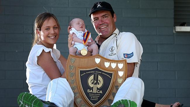 Port Adelaide Cricket Club veteran Matthew Weeks with his partner Tessa and son Lewis. Picture: Dean Martin