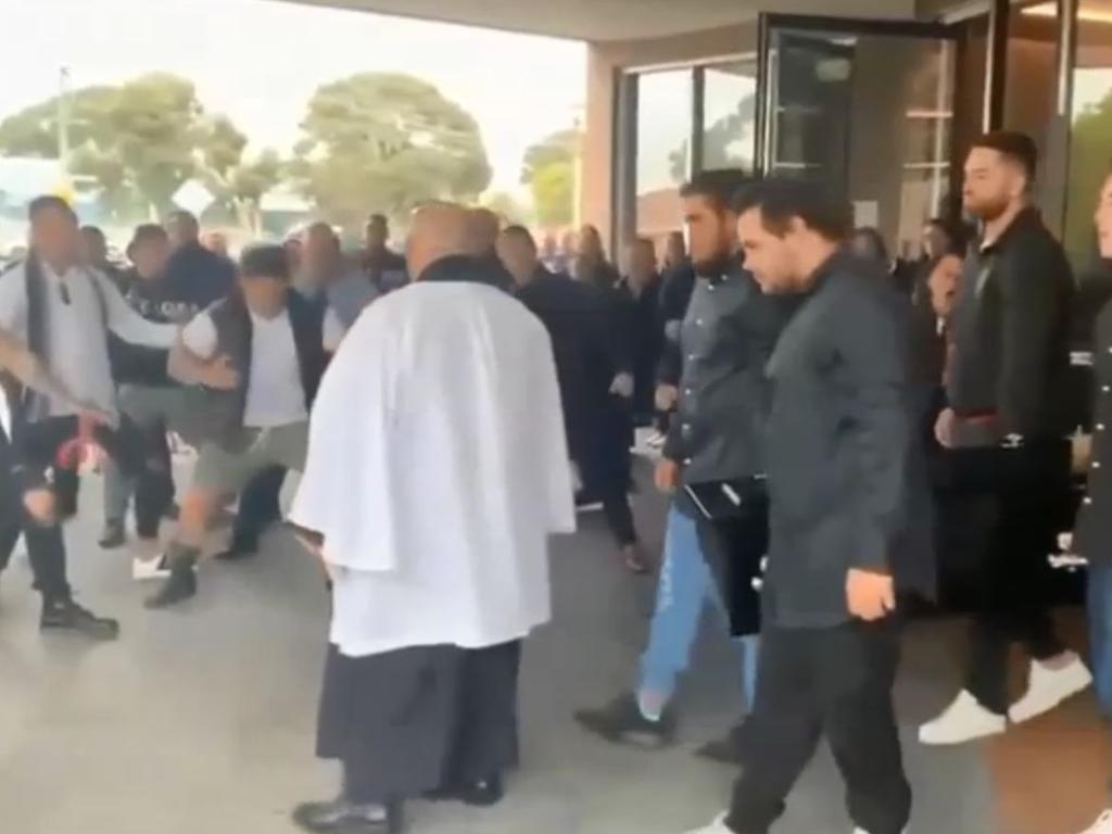 Pall-bearers carry Maaka Hakiwai as the haka is performed at his funeral in New Zealand. Picture: Supplied