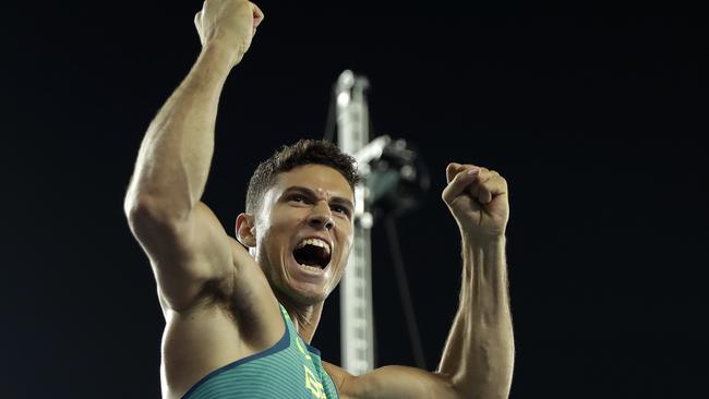 Brazil's Thiago Da Silva celebrates after setting a new Olympic record to win the gold medal in the men's pole vault final.