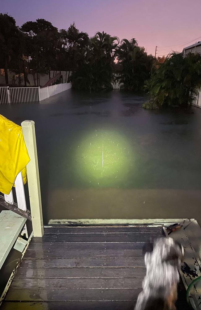 A house in Pimlico has water all through the backyard. Picture: Patrick Woods