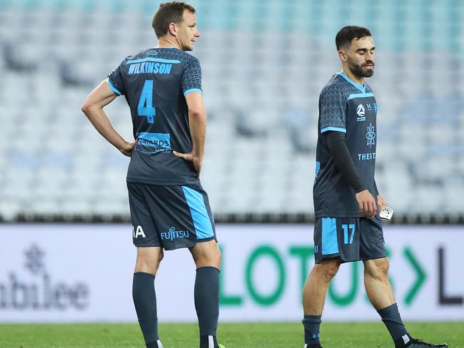 SYDNEY, AUSTRALIA - AUGUST 01: Alex Wilkinson and Anthony Caceres of Sydney FC looks dejected after defeat during the round 29 A-League match between Melbourne City and Sydney FC at ANZ Stadium on August 01, 2020 in Sydney, Australia. (Photo by Mark Kolbe/Getty Images)