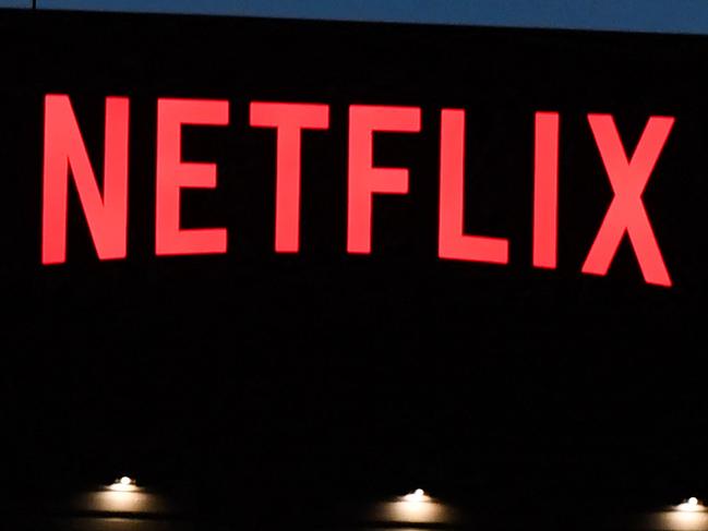 (FILES) In this file photo taken on October 19, 2021 the Netflix logo is seen on the Netflix, Inc. building on Sunset Boulevard in Los Angeles, California. - Netflix on January 19, 2023 said global subscribers to its streaming service jumped to more than 230 million people in the last three months of last year as hits such as "Wednesday" and "Harry & Meghan" drew in new viewers. (Photo by Robyn Beck / AFP)