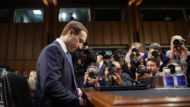 Facebook CEO Mark Zuckerberg appears  before a joint hearing of the Commerce and Judiciary Committees in Washington.