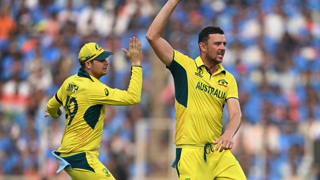 Josh Hazlewood celebratesafter taking the wicket of Ravindra Jadeja. (Photo by Punit PARANJPE / AFP)