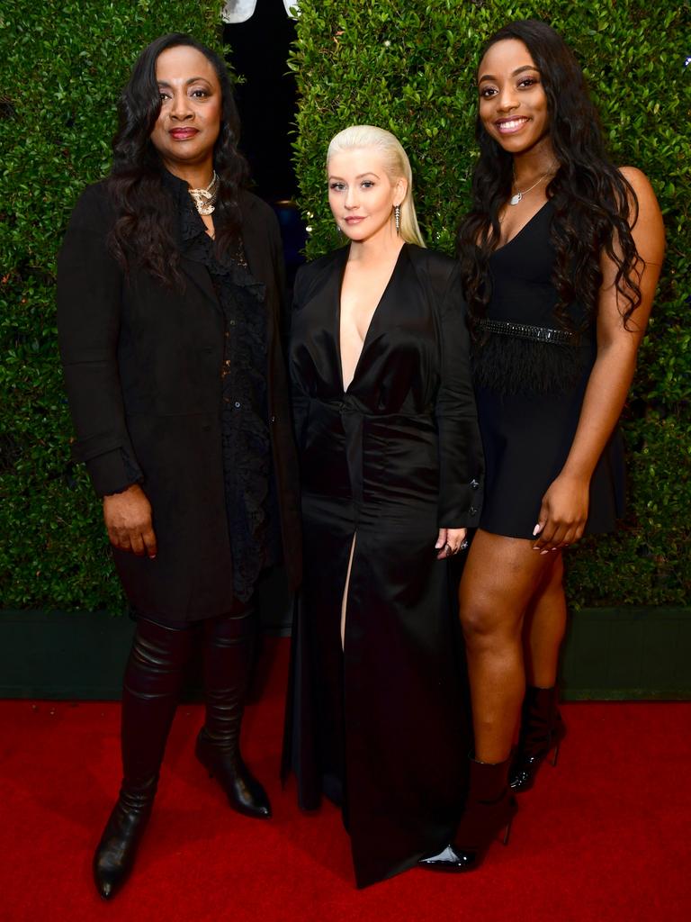 Pat Houston, Christina Aguilera, and Rayah Houston attend the 2017 American Music Awards at Microsoft Theater on November 19, 2017 in Los Angeles, California. Picture: Getty