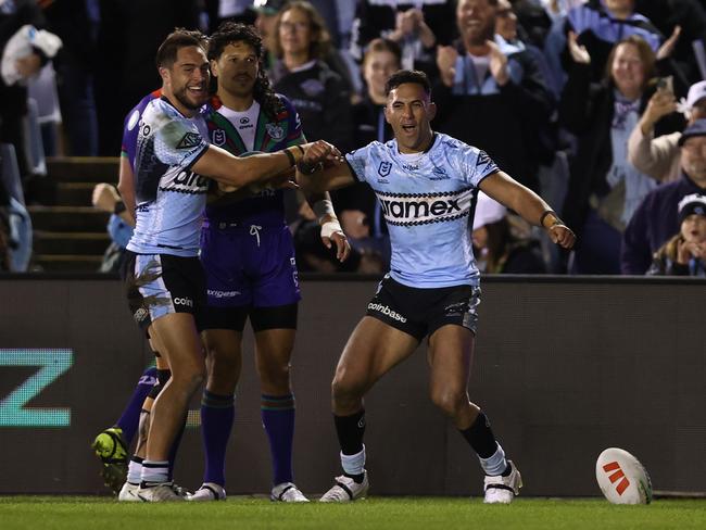 Kayal Iro celebrates a try. Picture: Jason McCawley/Getty Images