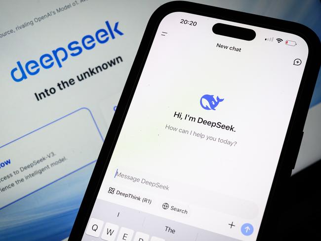 LONDON, ENGLAND - JANUARY 29: In this photo illustration, the Deepseek search page is displayed on a mobile phone in front of a laptop screen displaying the Deepseek homepage, on January 29, 2025 in London, England. This week's news that the DeepSeek Chatbot app, developed by China, was downloaded from the Apple app store significantly more times than the US-developed ChatGPT from Open AI, wiped billions off the global tech market. The advent of DeepSeek has shown there is a more viable, efficient, and cost-effective future for AI development in a shift away from the current high cost, high tech model.  (Photo by Leon Neal/Getty Images)