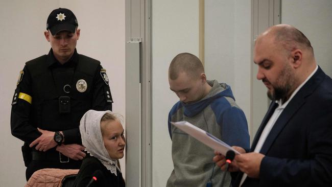 Russian Sergeant Vadim Shishimarin listens as a translator reads the verdict. Picture: AFP