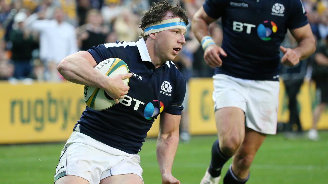 Hamish Watson of Scotland runs to score a try at Allianz Stadium in Sydney.