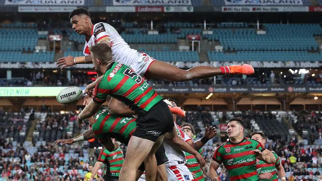 A high-flying Jason Saab during a match against South Sydney last season. Pic: Brett Costello