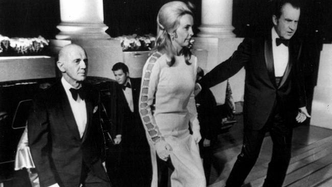 US President Richard Nixon escorts Sonia McMahon, wearing 