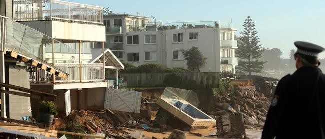 The properties on Pittwater Rd north of Ramsay st in Collaroy shortly after the storm. Picture: John Grainger.