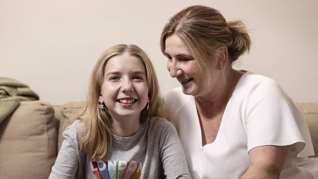 Cystic fibrosis sufferer Lyla Gillard, 12, with her mother Hayley, is alive only because of a wonder drug that is available overseas but not in Australia. Picture: Marie Nirme