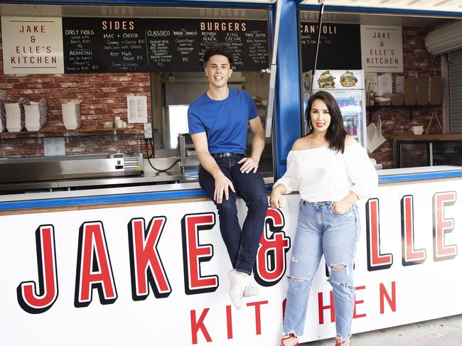 Jake and Elle Harrison at their Eat Street stall. (AAP Image/Attila Csaszar)