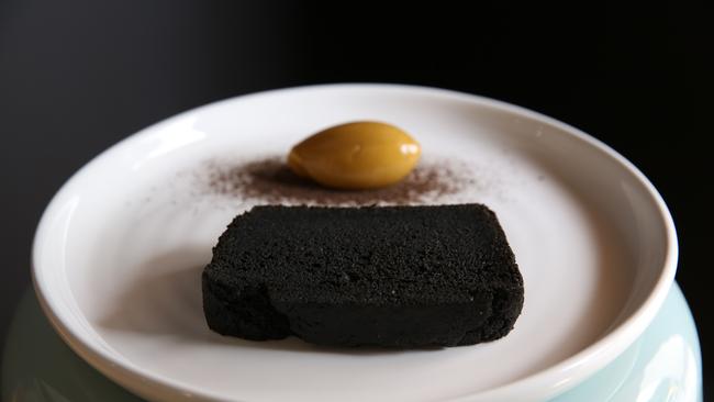 Gauge, South Brisbane, Black garlic bread, brown butter and burnt vanilla. Picture: David Kelly