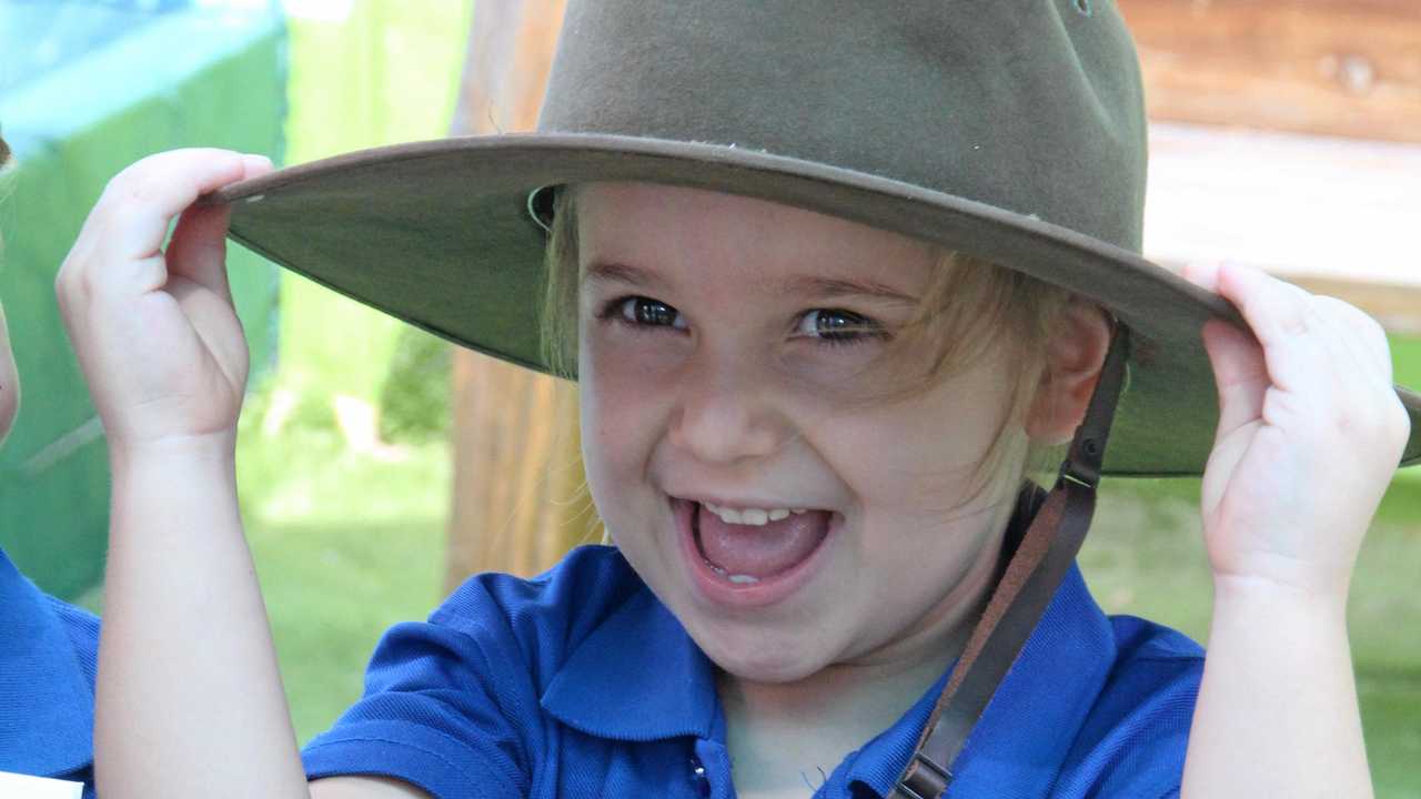 ALL SMILES: Emmerson is all smiles while creating a care pack for Australian soldiers at Rainbow Station in Casino. Picture: Lily Laughton-Cook