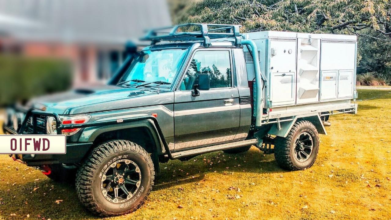 A silver 2017 Toyota LandCruiser utility with Queensland registration 01FWD was stolen in a violent carjacking.